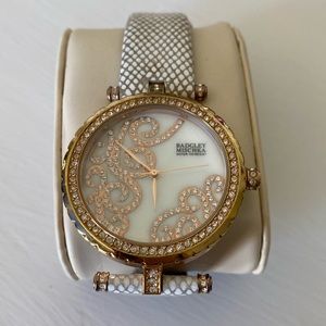 Badgley Mischka watch with crystals all around.